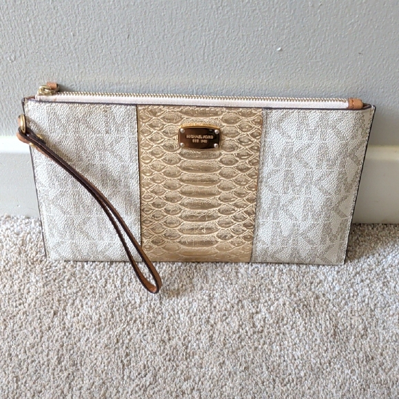 Michael Kors Handbags - Michael Kors Cream and Gold Logo Wristlet Clutch